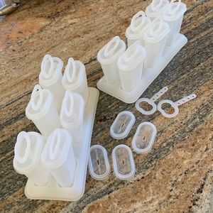 Tupperware popsicle/pudding pops. 2 sets with extra pieces, excellent condition